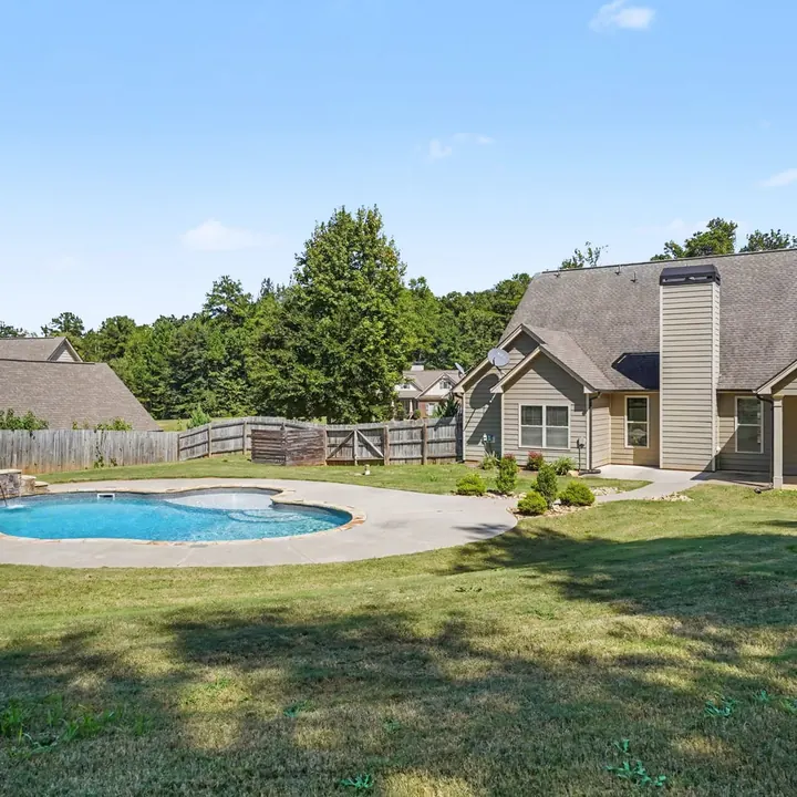 Community pool with homes behind it in the Sage Creek neighborhood